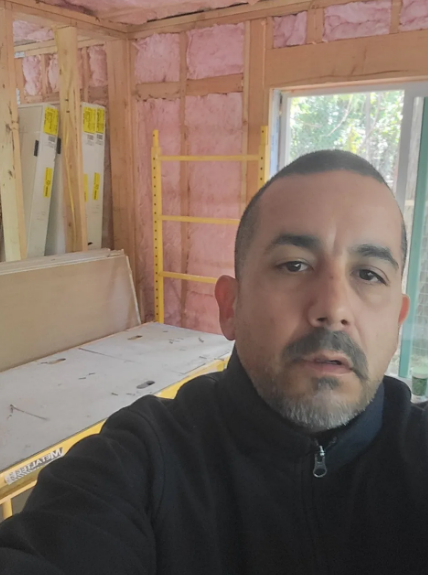 Owner Monserrate Perez on a drywall job site