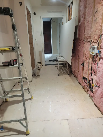 Interior renovation with new drywall framing and insulation
